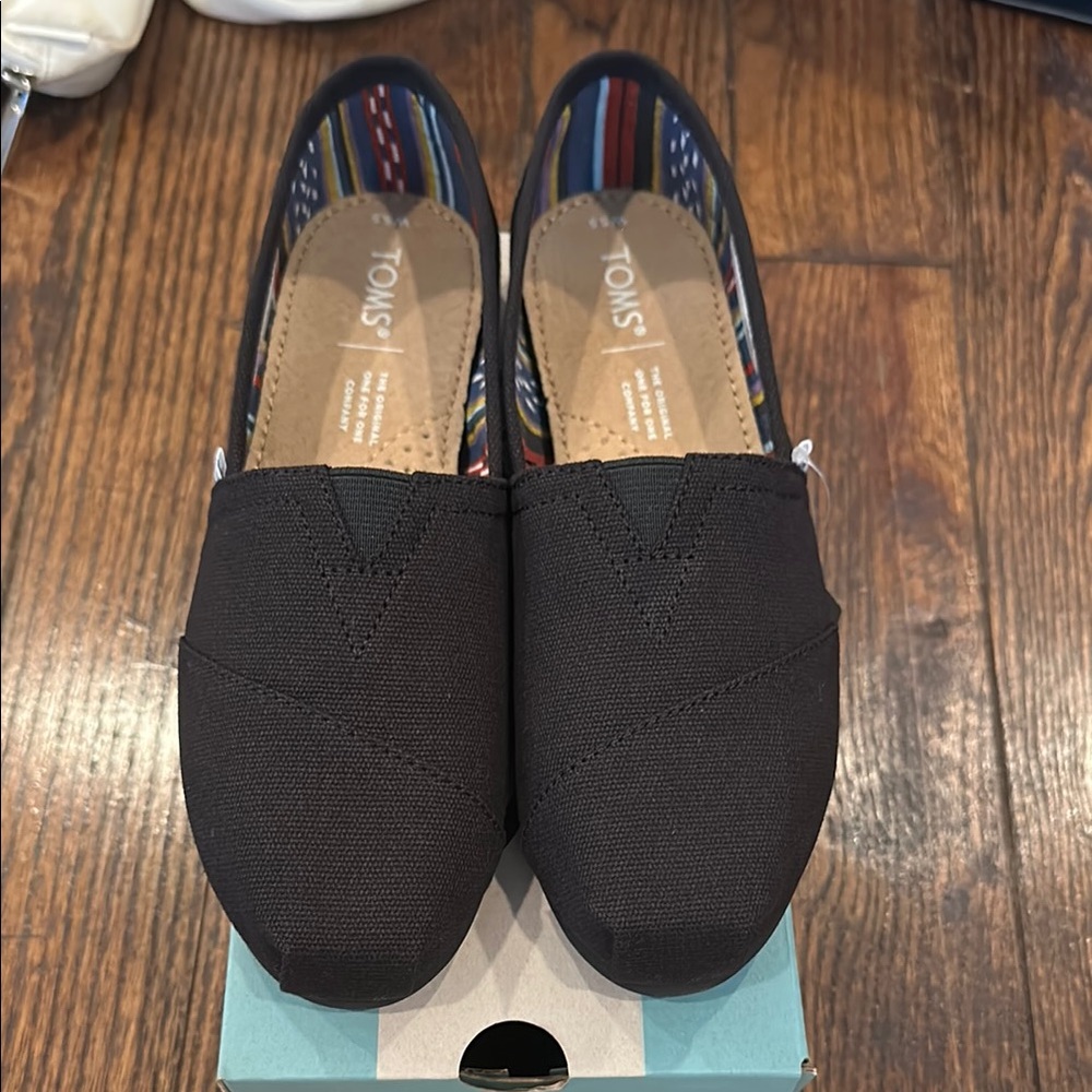 TOMS Classic Black Canvas Slip-Ons